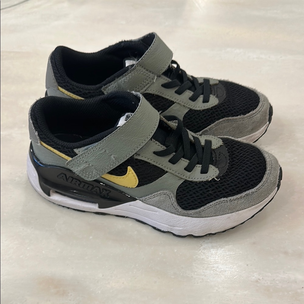 Nike Black and Gray Sneakers with Sporty Design